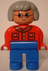 Duplo-figuurtje, vrouwelijk, blauwe benen, rode jas, lichtgrijs haar, bril