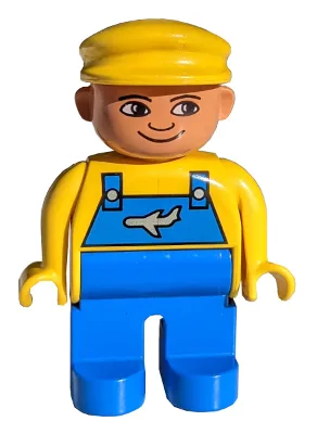 Duplo-Figur, männlich, blaue Beine, gelbes Oberteil mit blauer Latzhose mit Flugzeugmotiv, gelbe Mütze