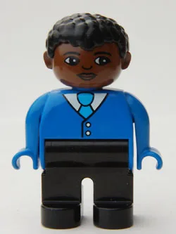 Duplo-Figur, männlich, schwarze Beine, blaues Oberteil mit Knöpfen und Krawatte, schwarze lockige Haare, brauner Kopf