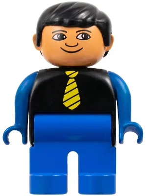 Duplo-Figur, männlich, blaue Beine, schwarzes Oberteil mit gelber Krawatte, blaue Arme, schwarze Haare, weiße Augen