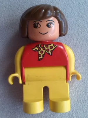Duplo-figuurtje, vrouwelijk, gele benen, rode top met gele sjaal met stippen, gele armen, bruin haar, grijns