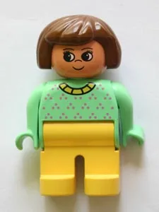 Duplo-Figur, weiblich, gelbe Beine, hellgrünes Oberteil mit violetten Punkten, gelber Kragen, braune Haare