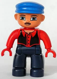 Duplo Figur Lego Ville, männlich, dunkelblaue Beine, rotes Oberteil mit schwarzer Weste, rote Hände, blaue Mütze, blaue Augen, Schnurrbart