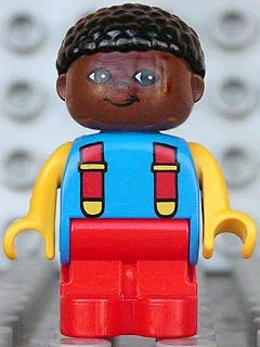 Duplo-Figur, Kind Typ 1 Junge, rote Beine, blauer Oberkörper mit 2 Riemen, gelbe Arme, brauner Kopf mit schwarzen lockigen Haaren