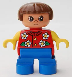 Duplo-Figur, Mädchen, Typ 2, blaue Beine, roter Oberkörper mit Blumenmuster, Kragen und 2 Knöpfen, gelbe Arme, braune Haare