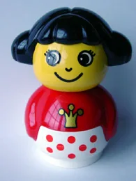 Figurine Primo Fille avec socle blanc à pois rouges, haut rouge à motif de couronne, cheveux noirs