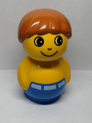 Primo figuurtje: jongen met blauwe basis, geel bovenstuk en donkeroranje haar.