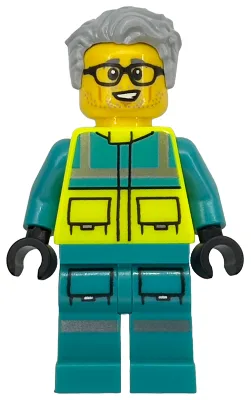 Ambulancier – Homme, gilet de sécurité turquoise foncé et jaune fluo, jambes avec bandes réfléchissantes argentées, lunettes, cheveux gris clair bleuté