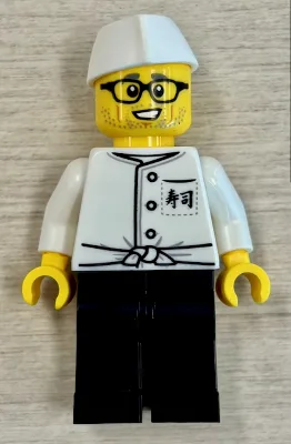 Torse de chef sushi avec logogramme japonais « ?? » (sushi) sur la poche avant, pantalon noir