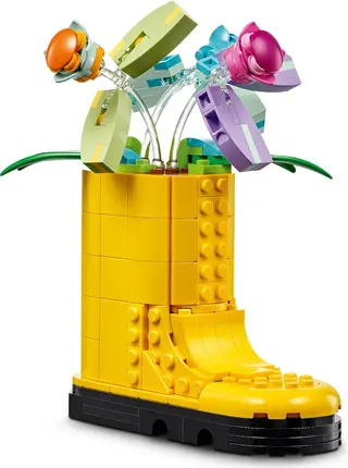 Fleurs dans l'arrosoir