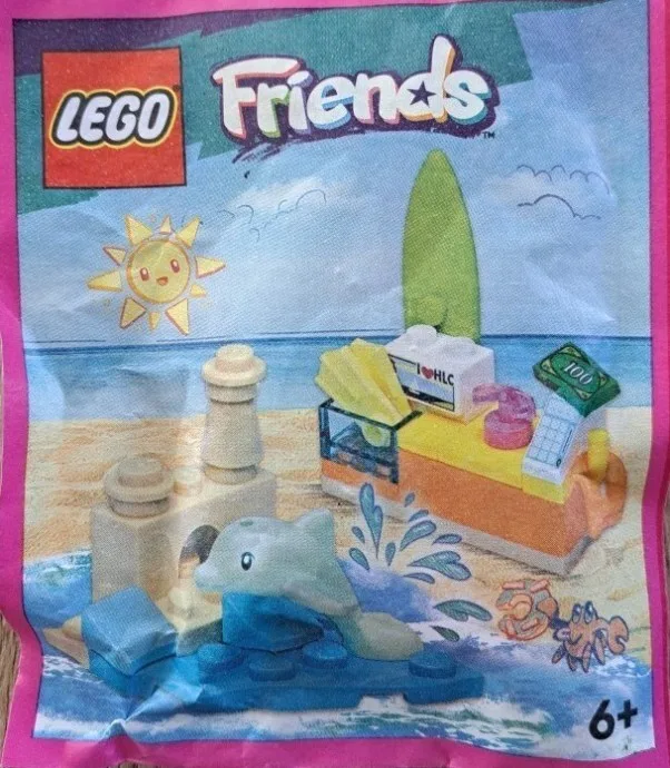 Strandladen und Delfin