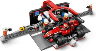 F1 pitstop en pitcrew met Ferrari-auto
