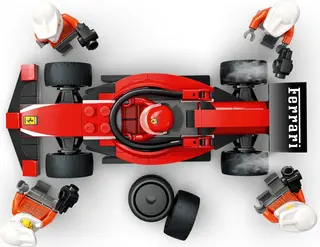 F1 pitstop en pitcrew met Ferrari-auto